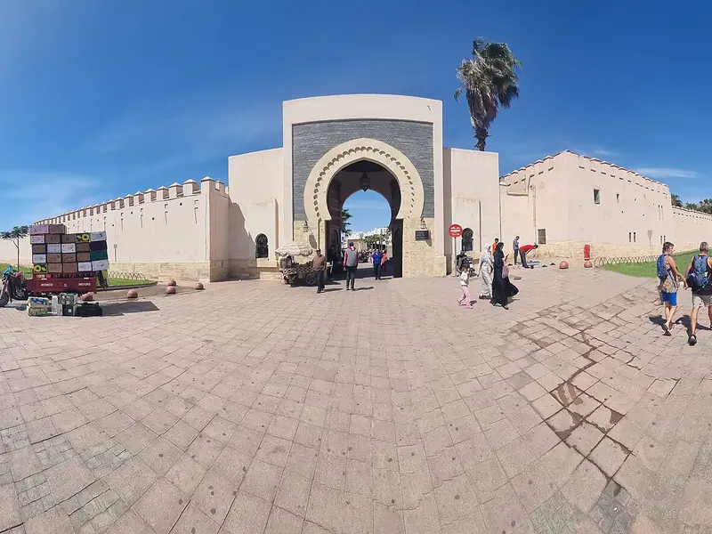 The arched gateway of Souk El Had market in Agadir under a blue sky